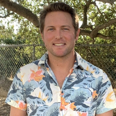 Andy MacDonald wears a floral print shirt