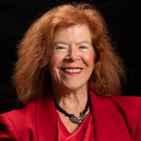 Jody Enders wears a red suit